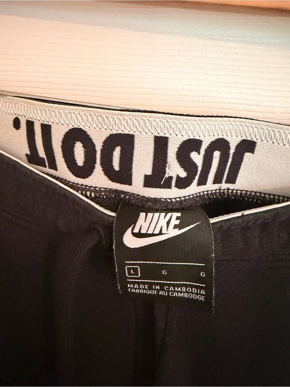 Nike Black Sweatpants with White Swoosh